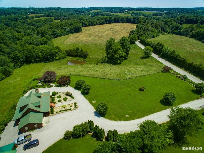 Aerial photo of log home estate home